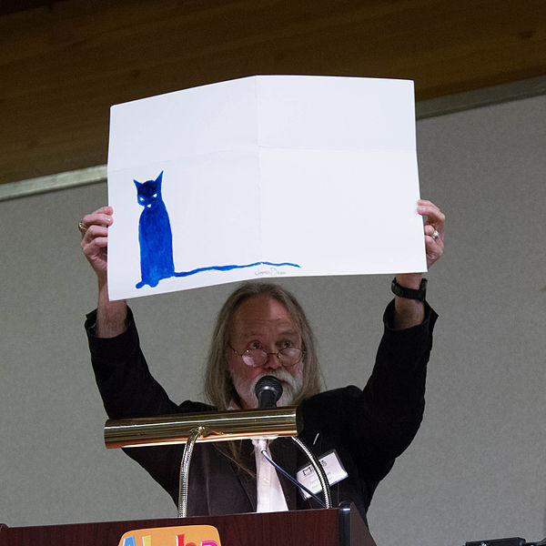 English:   James Dean holding up his original drawing of Pete the Cat at the 2013 Mazza Summer Conference.