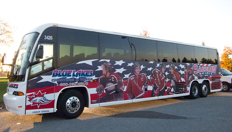 English:   Saginaw Spirit team bus, parked outside the Kitchener Auditorium prior to a game.