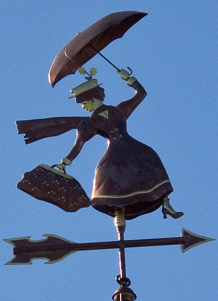 English:   The awesome Mary Poppins weathervane atop the new Jolly Holiday Bakery Cafe at Disneyland.