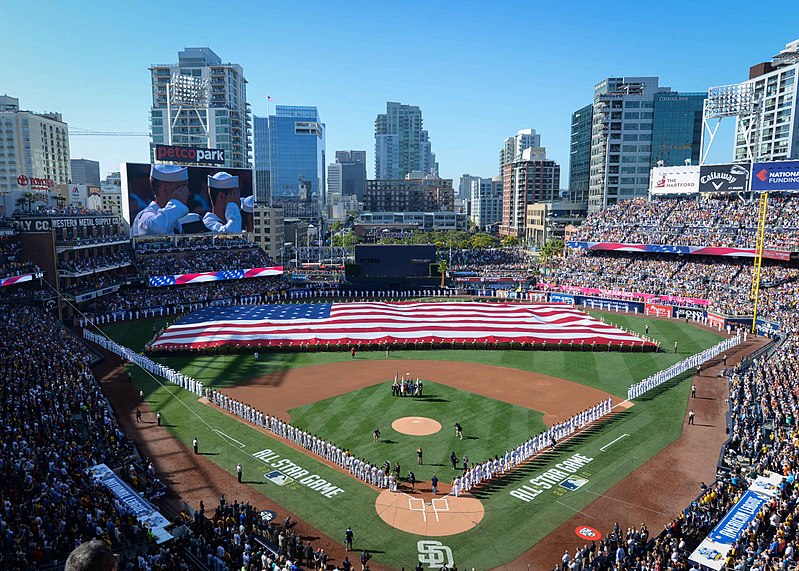 English:   160712-N-NV908-496 SAN DIEGO (July 12, 2016) Sailors man the rails while Marines hold up the American flag during the pre-game ceremony of the 2016 Major League Baseball All-Star Game at Petco Park. Sailors from the aircraft carrier USS Theodore Roosevelt (CVN 71) and Marines from the 3rd Marine Aircraft Wing joined together to participate in a salute to the United States Armed Forces. (U.S. Navy photo by Mass Communication Specialist 3rd Class Chad M. Trudeau)