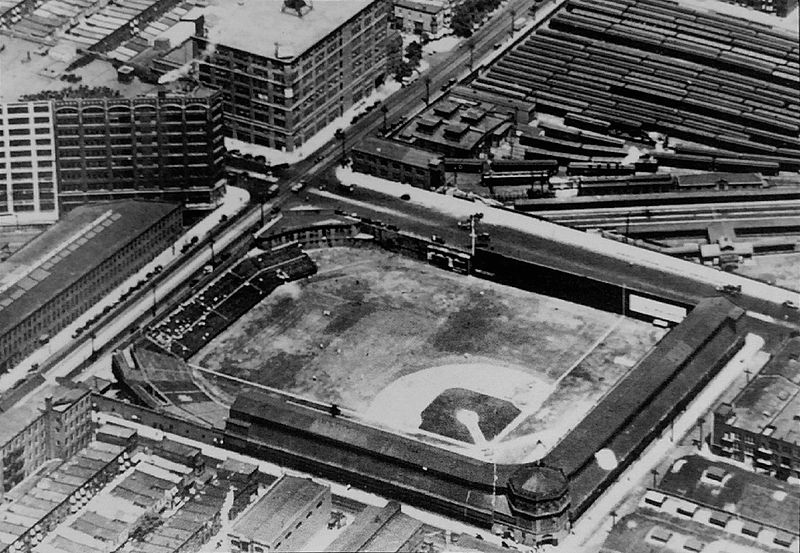 English:   The Baker Bowl in 1928, with the soon-to-be-demolished Huntingdon Street station at right