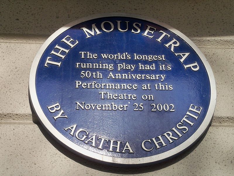 English:  A blue plaque on the front wall of St Martin's Theatre, Covent Garden, London.