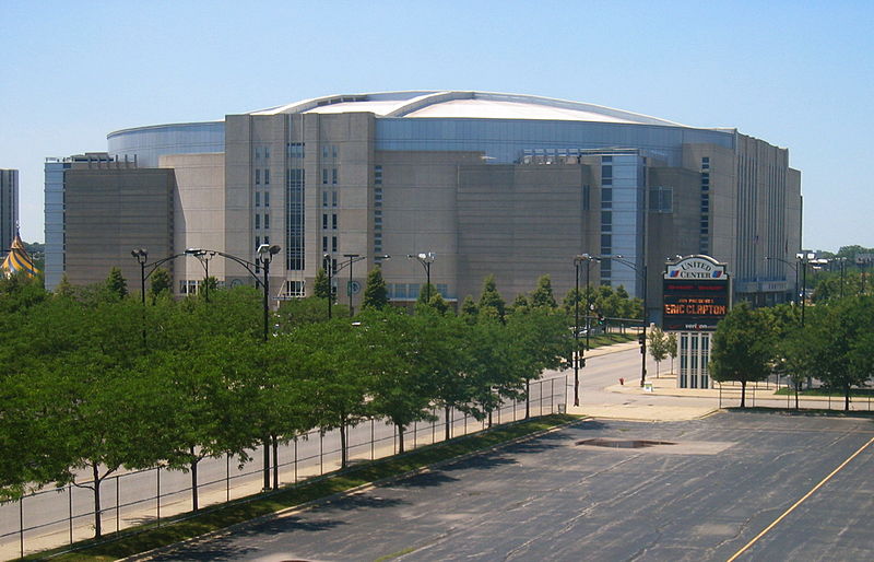 The United Center in Chicago, Illinois, home of the Chicago Bulls NBA team and Chicago Blackhawks NHL team. Photographed from 41°52′54″N  87°40′12″W    /  41.8818°N 87.6701°W  / 41.8818; -87.6701      in a train on the Pink Line of the Chicago 'L'.